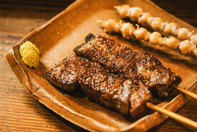 佐渡牛の串焼きとイカの口